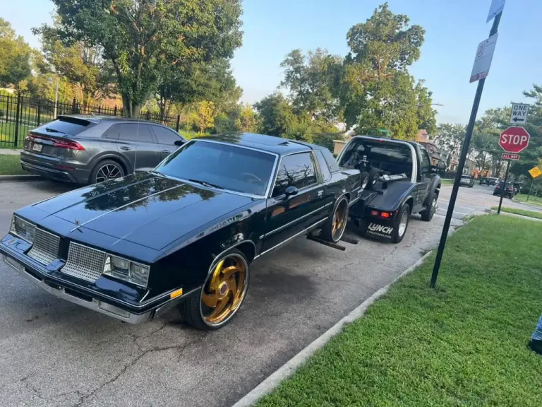 Classic car being safely towed by Blackhawks Towing in Chicago.