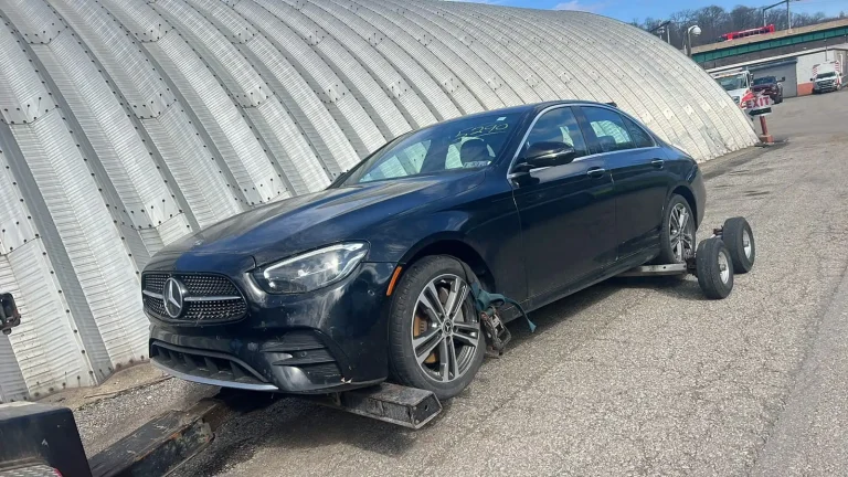 Mercedes sedan being safely transported by Blackhawks Towing in Chicago.